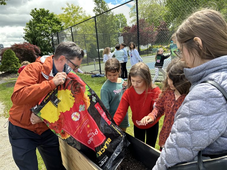 Students preparing raised bed
